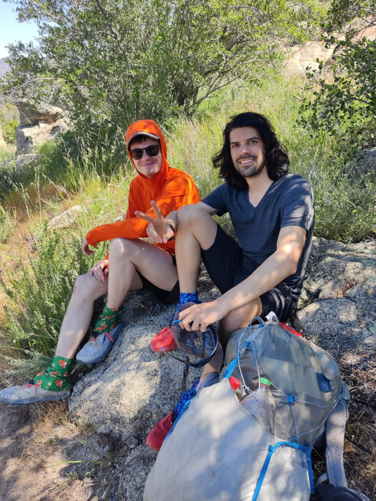 Leo, our newfound Swiss friend sitting on a rock