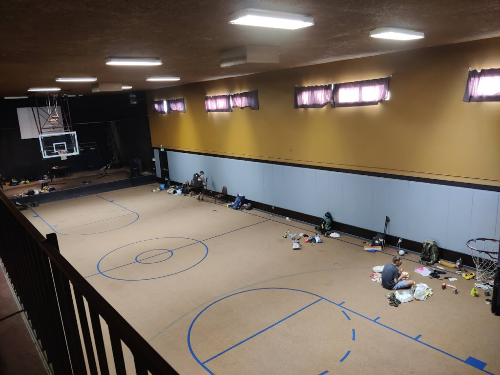 A basketball court in a church gymnasium where we spent the night