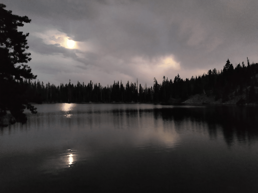 Late night sitting at a lake